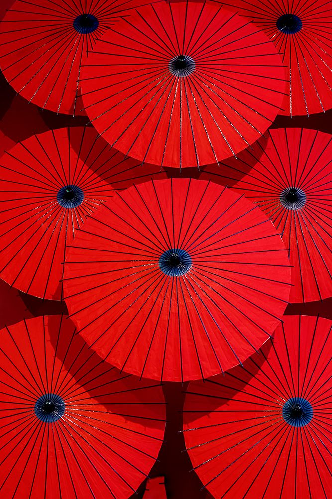 Red paper parasols on display, Arashiyama, Kyoto, Japan
